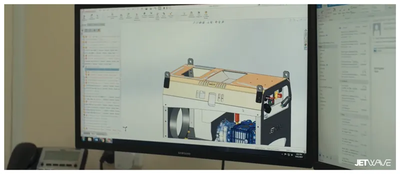 CAD software with Jetwave machine model on a computer screen.