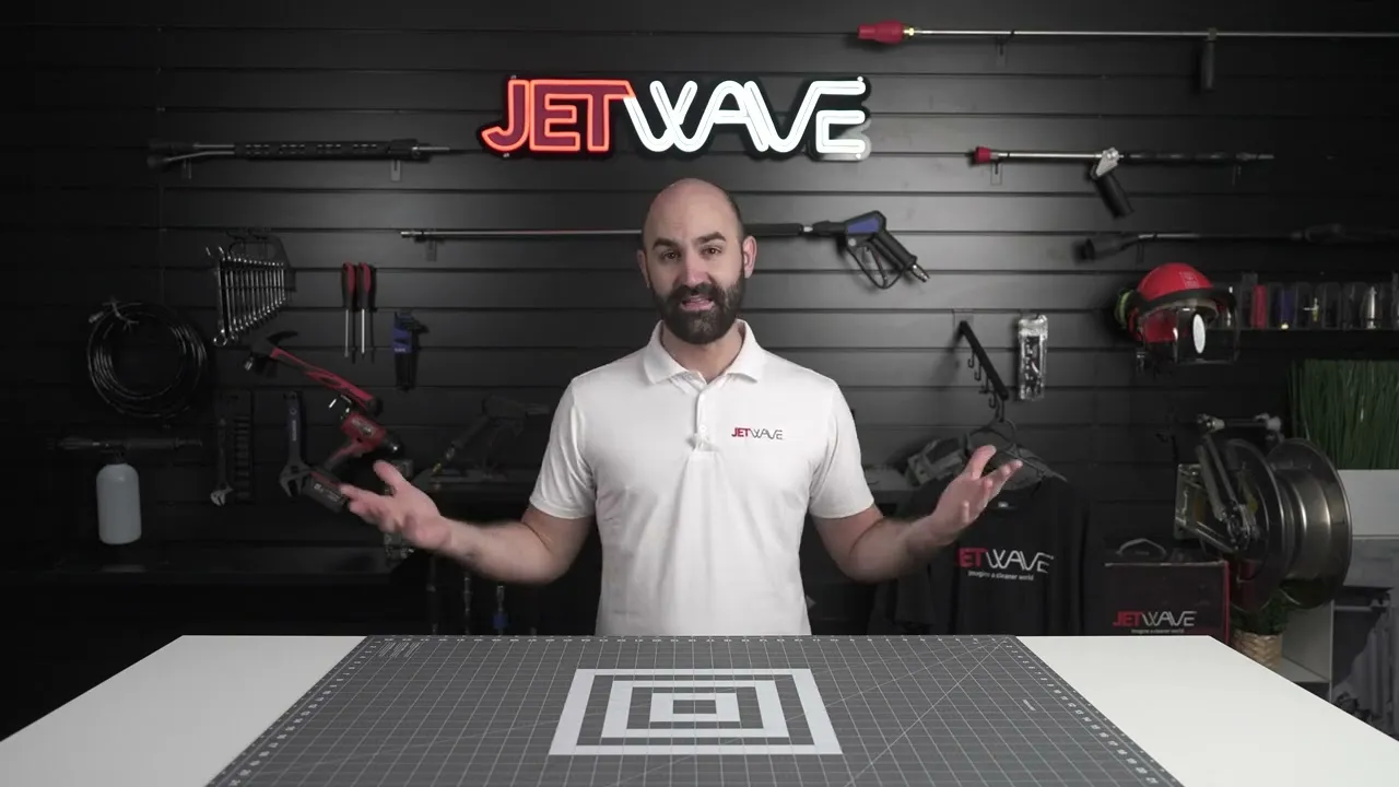 Presenter in the new Jetwave Group YouTube studio with black walls.